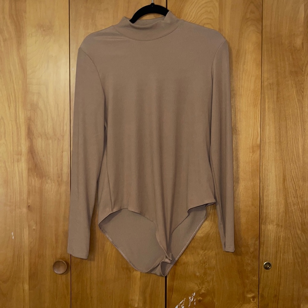 Turtle neck tan long sleeve one piece shirt